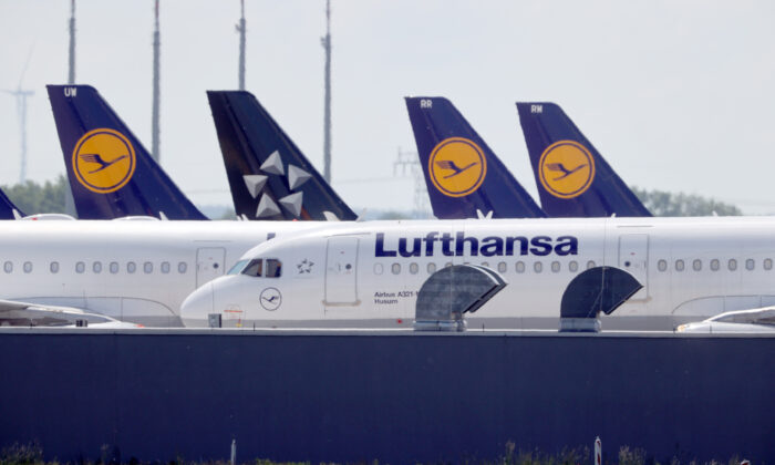 Airplanes of German carrier Lufthansa are parked at the Berlin Schoenefeld airport, amid the spread of the coronavirus disease (COVID-19) in Schoenefeld, Germany, on May 26, 2020. (Fabrizio Bensch/Reuters)