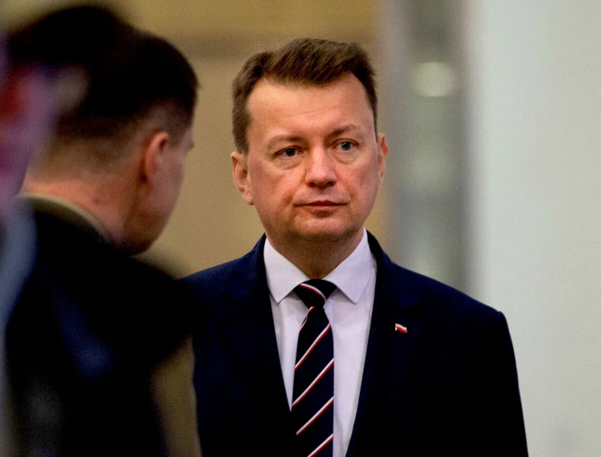 Polish Defence Minister Mariusz Blaszczak waits for the arrival of U.S. Secretary for Defence Mark Esper prior to a meeting at NATO headquarters in Brussels, Belgium, on Feb. 12, 2020. Virginia Mayo/Pool via Reuters)