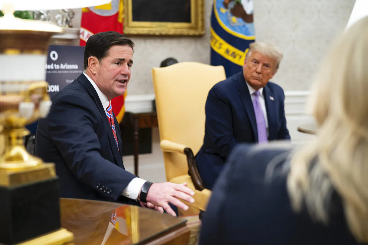 President Donald Trump meets with Arizona's Governor Doug Ducey in the Oval Office, in Washington, on Aug. 5,  2020. (Doug Mills/The New York Times via Getty Images)