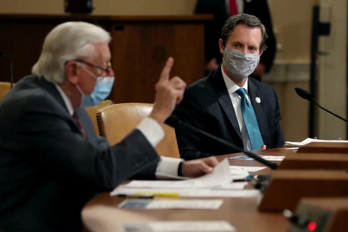 Rep. Rodney Davis (R-Ill.) (R) listens to House Majority Leader Steny Hoyer (D-Md.) in Washington on May 14, 2020. (Chip Somodevilla/Getty Images)