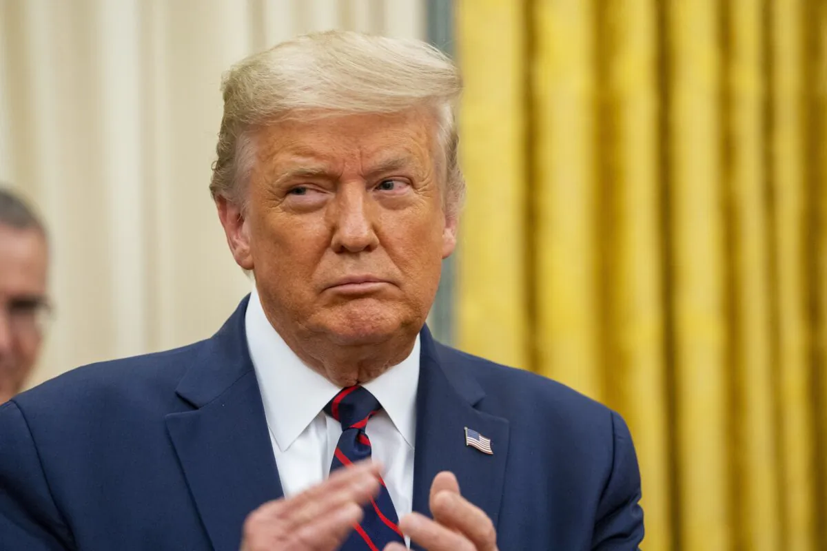 President Donald Trump participates in an event in the Oval Office of the White House on Aug. 4, 2020. (Doug Mills/Pool/Getty Images)