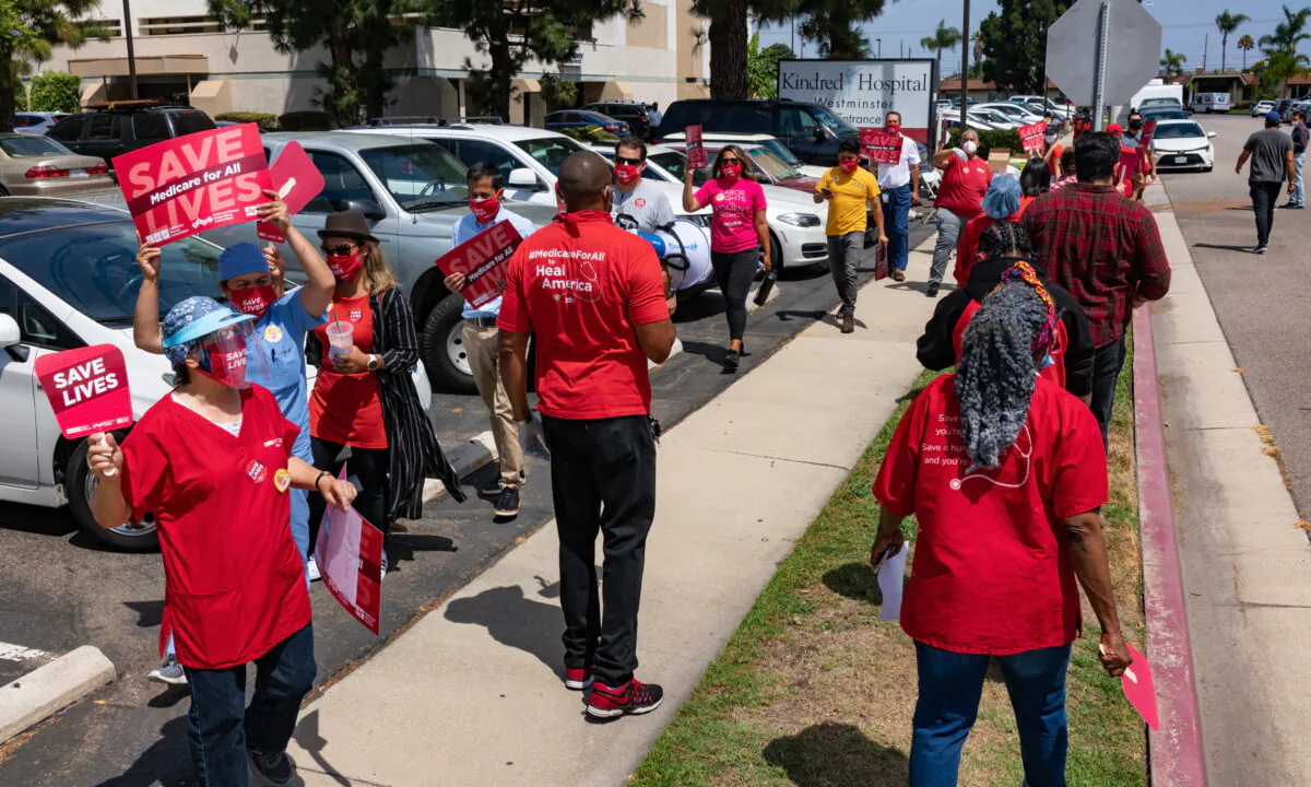 Nurses gather for a rally to demand better protection against the COVID-19 pandemic outside Kindred Hospital Westminster in Westminster, Calif., on Aug. 5, 2020. (John Fredricks/The Epoch Times)