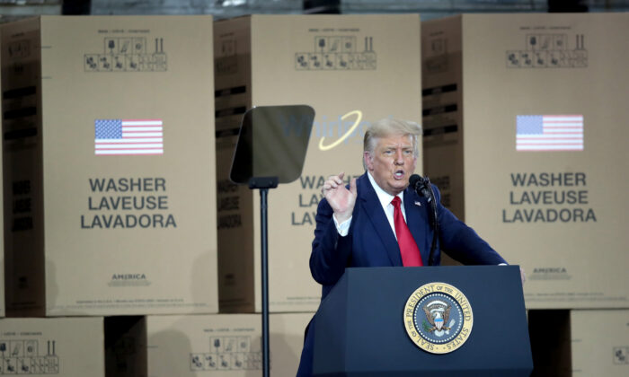 U.S. President Donald Trump speaks to workers at a Whirlpool manufacturing facility in Clyde, Ohio on Aug. 6, 2020. (Scott Olson/Getty Images)