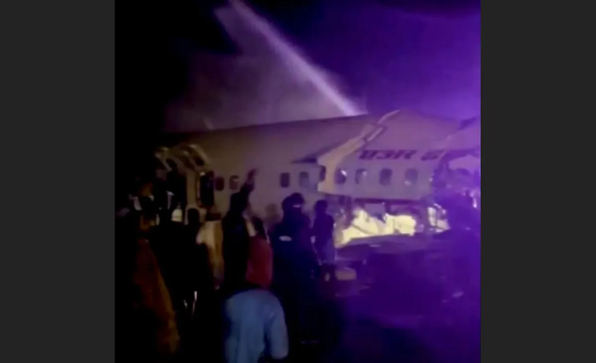 A passenger plane that crashed after it overshot the runway is seen at Calicut International Airport in Karipur, southern state of Kerala, India, on Aug. 7, 2020, in this still image obtained from a video. (ANI/Reuters TV/via Reuters)