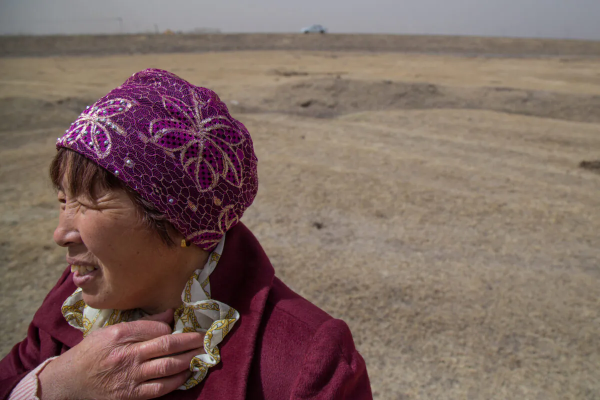A dairy farmer in Inner Mongolia looks out onto the grasslands in Tuanjiecun, China, on April 30, 2019. (Betsy Joles/ Getty Images)