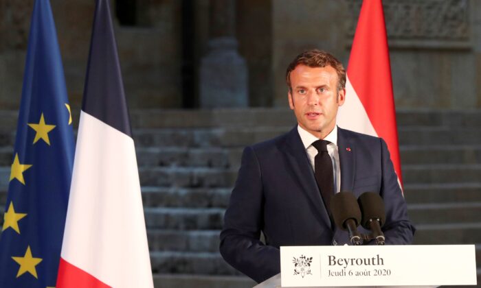 French President Emmanuel Macron delivers his speech during a news conference, following Tuesday's blast in Beirut's port area, in Beirut, Lebanon, on Aug. 6, 2020. (Thibault Camus/Pool via Reuters)
