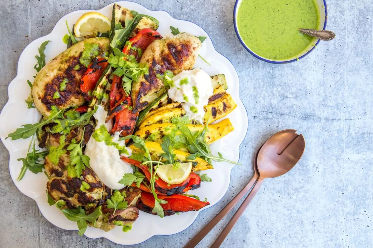 A perfect platter: grilled chicken and veggies, lots of burrata, a sprinkle of peppery arugula, a generous drizzle of sauce. (Photo by Caroline Chambers)