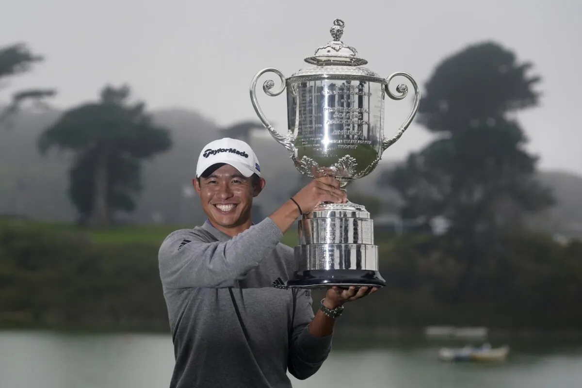 Collin Morikawa holds the Wanamaker Trophy after winning the PGA Championship golf tournament at TPC Harding Park on Aug. 9, 2020, in San Francisco, California. (Jeff Chiu/AP Photo)