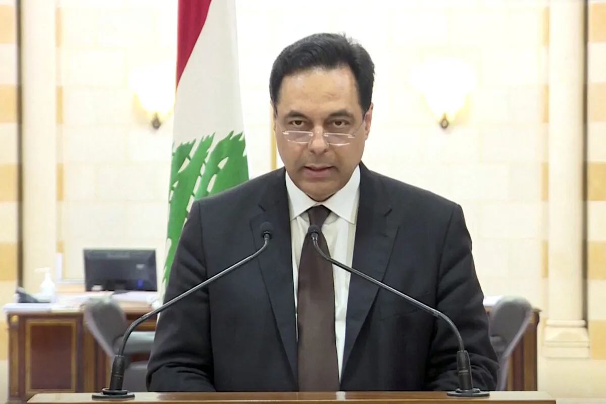 Lebanon's Prime Minister Hassan Diab speaks at the government palace in Beirut, Lebanon, on Aug. 10, 2020. (Tele Liban/Handout via Reuters)