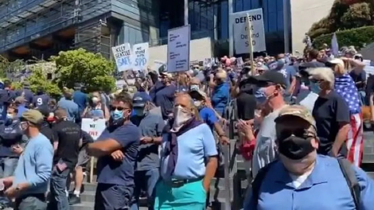 In this still image via video, ralliers chant during a "back the blue" rally in Seattle, Wash., on Aug. 9, 2020. (Katie Daviscourt via The Epoch Times)