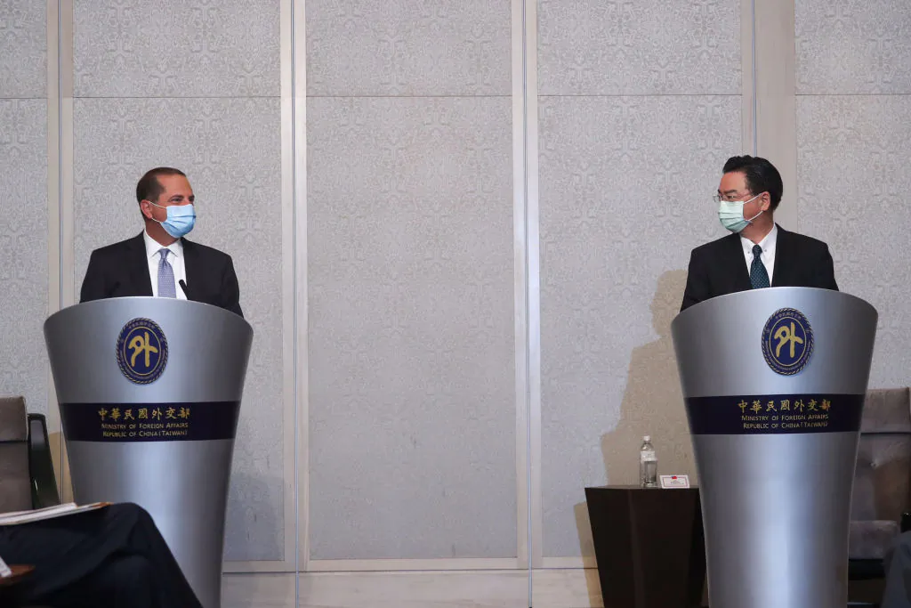 US Secretary of Health and Human Services Alex Azar (L) speaks while meeting with Taiwan's Foreign Minister Joseph Wu (R) at a local hotel in Taipei on Aug. 11, 2020. (Pei Chen/POOL/AFP via Getty Images)