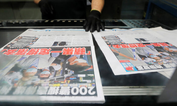 Hong Kong’s Apple Daily Vows to Fight On After Owner Arrested