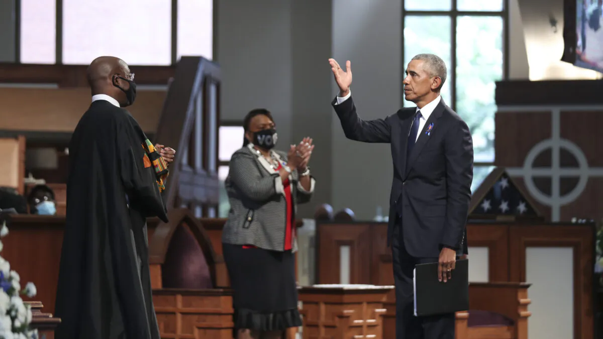 Former President Barack Obama gestures after speaking during the funeral service of the late Rep. John Lewis (D-Ga.) at Ebenezer Baptist Church in Atlanta on July 30, 2020. (Alyssa Pointer/Pool/Getty Images)