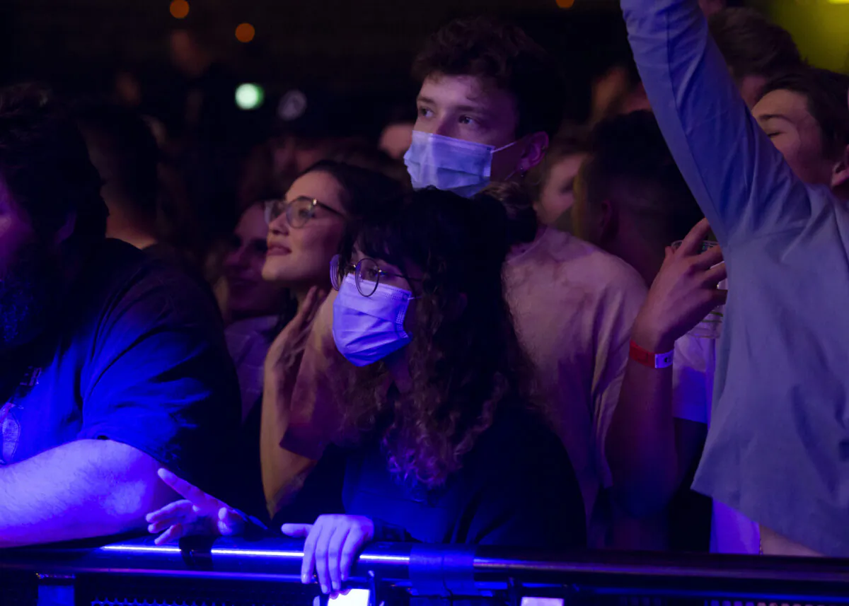 Music fans wear PPE at Castaway Unlocked at HBF Stadium in Perth, Australia on July 18, 2020. (Matt Jelonek/Getty Images)
