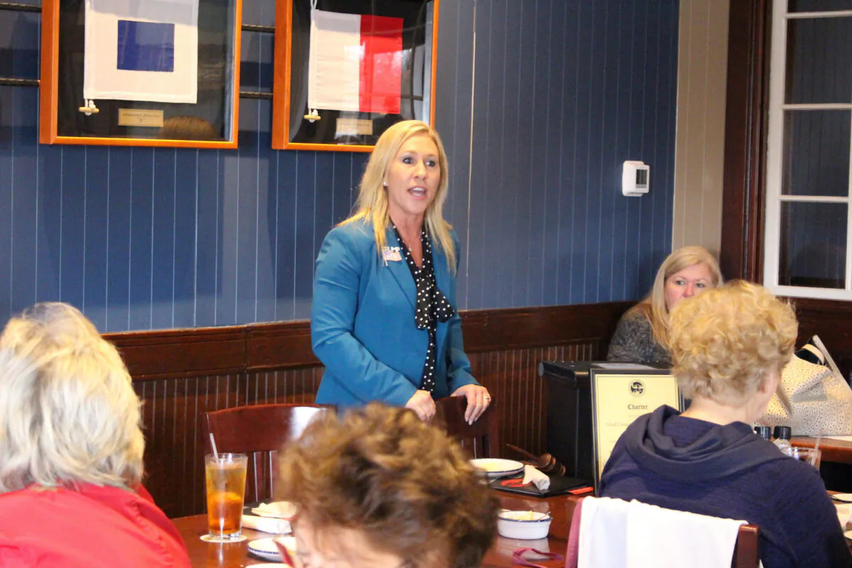 Republican Marjorie Taylor Greene speaks to a GOP women's group in Rome, Ga., on March 3, 2020. (John Bailey/Rome News-Tribune via AP)