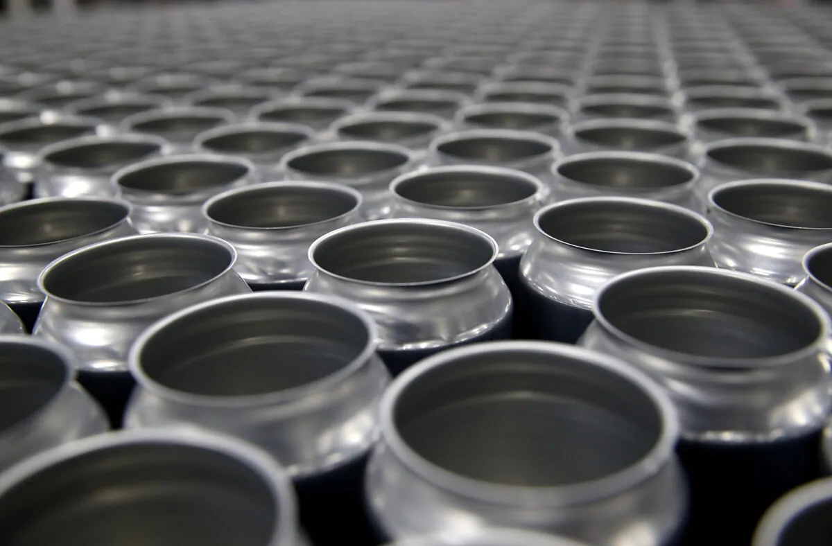 Stacks of empty aluminum cans sit on a pallet before being filled with beer at Devil's Canyon Brewery in San Carlos, California in a file photo. New tariffs imposed by the United States on aluminum from Canada could cause the price of canned beer and soft drinks to rise. Canada is taking decisive action to counter the 10 percent tariff. (Justin Sullivan/Getty Images)