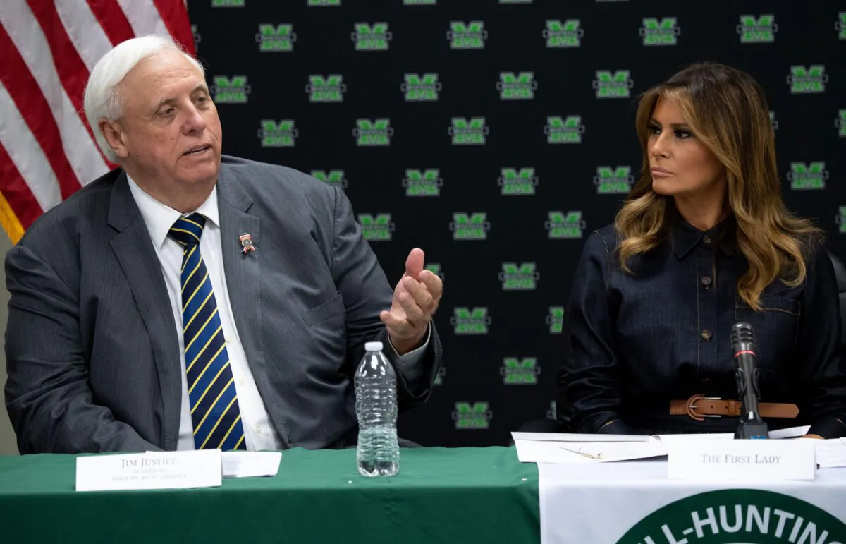 West Virginia governor Jim Justice, left, attends a roundtable with First Lady Melania Trump in Huntington, W.Va., on July 8, 2019. (Saul Loeb/AFP via Getty Images)