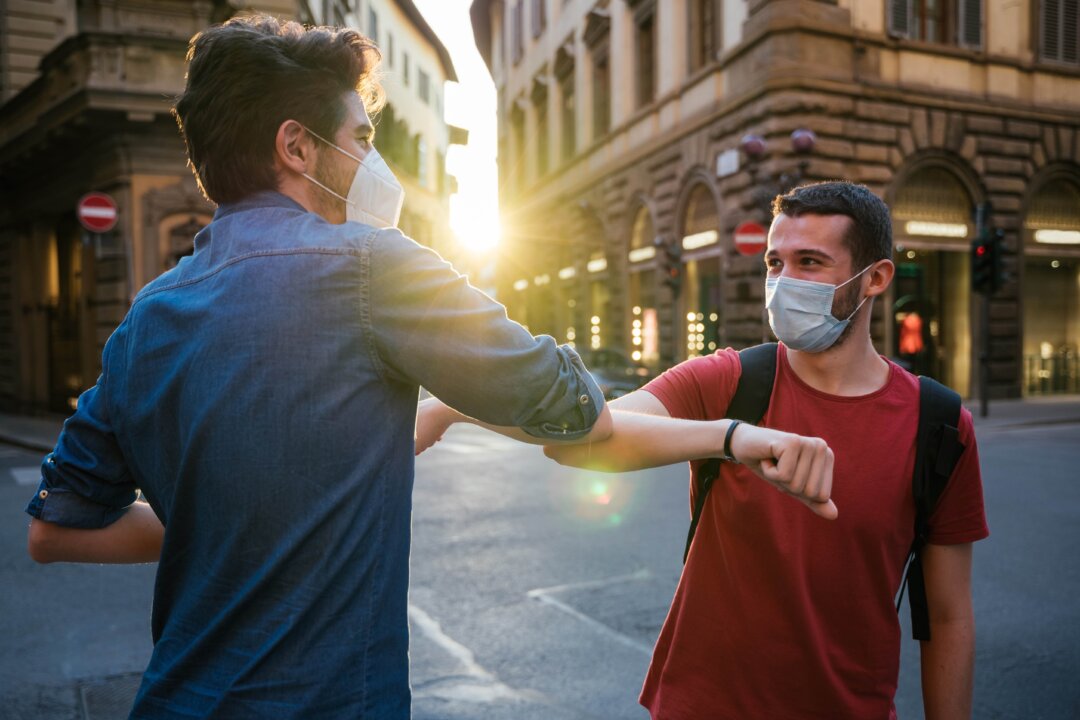COVID-19 may prevent old habits of social connection, but we can find new ways to affirm our regard for each other with a little effort. (loreanto/Shutterstock)