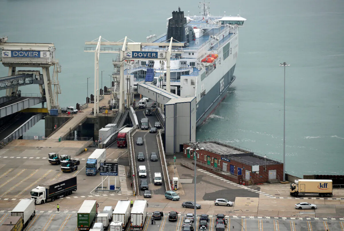 Cars leave a ferry at the Port of Dover as Britain imposes a 14-day quarantine on arrival from France from Saturday amid the CCP virus pandemic, in Dover, Britain, on Aug. 14, 2020. (Reuters/Peter Cziborra)