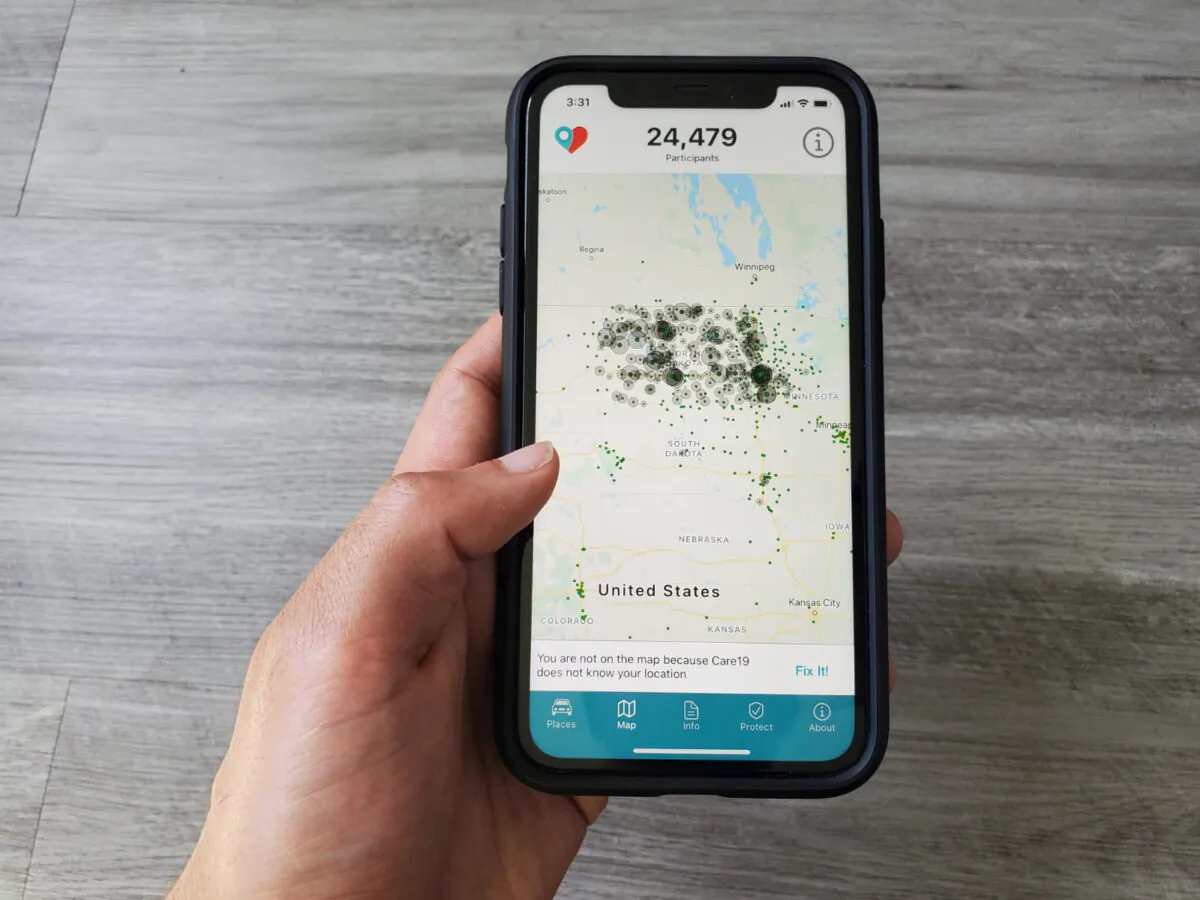 The Care19 mobile app, which the governors of North Dakota and South Dakota have asked residents to download to assist in contact tracing during the global outbreak of the COVID-19, is seen on a phone, on April 24, 2020. (Paresh Dave/Reuters)