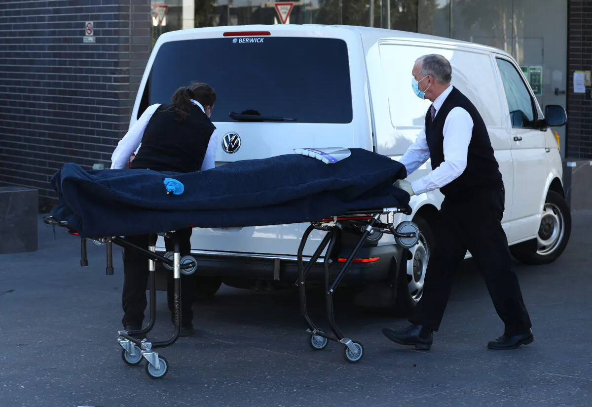 A body is removed from the Epping Gardens Aged Care Home, Melbourne, Australia on July 29, 2020. (Robert Cianflone/Getty Images)