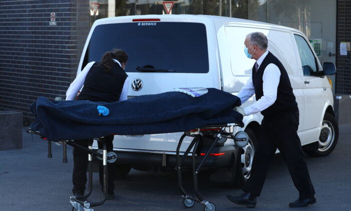 A body is removed from the Epping Gardens Aged Care Home, Melbourne, Australia on July 29, 2020. (Robert Cianflone/Getty Images)