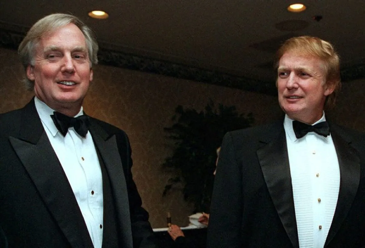 In this Nov. 3, 1999 file photo, Robert Trump (L), joins real estate developer and presidential hopeful Donald Trump at an event in New York. A tell-all book by President Donald Trump's niece cannot be published until a judge decides the merits of claims by the president's brother, her uncle Robert Trump, that its publication would violate a pact among family members, a judge said on June 30, 2020. (AP Photo/Diane Bonadreff)
