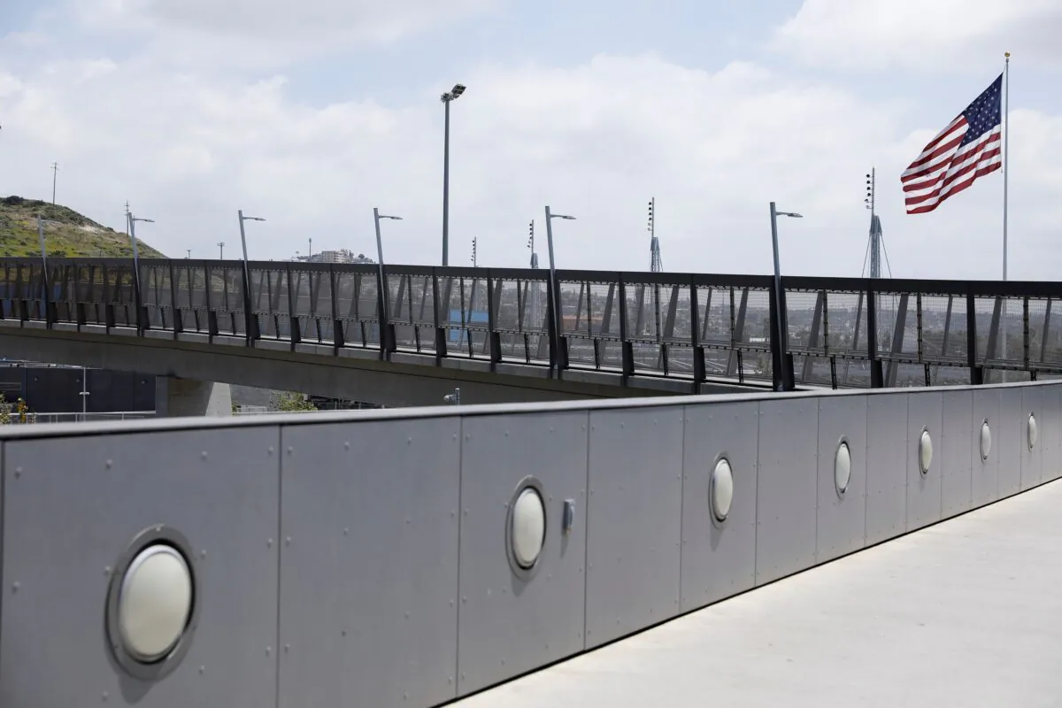 An empty walkway at the U.S.-Mexico border during the outbreak of the CCP virus, in San Diego, Calif., on April 21, 2020. (Mike Blake/Reuters)