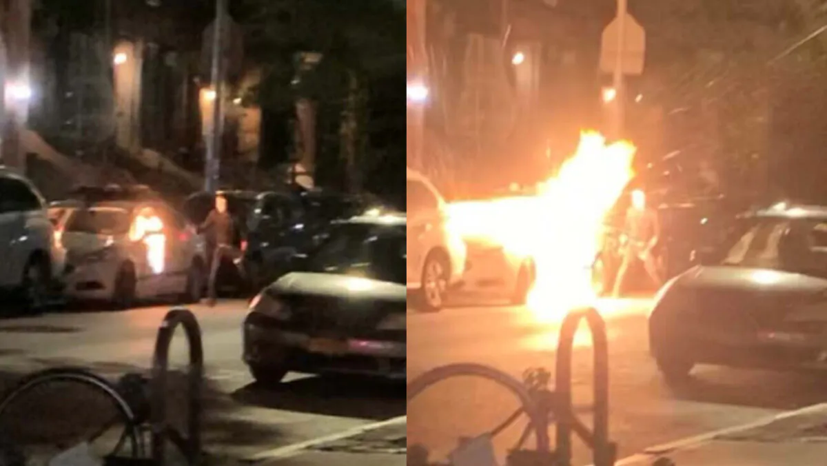 An NYPD vehicle is lit on fire on West 83rd Street toward Central Park, New York, in the early hours of July 29, 2020. (U.S. District Court Eastern District of New York)