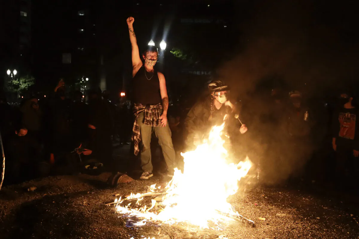 A Black Lives Matter protest at the Mark O. Hatfield United States Courthouse in Portland, Ore., on July 25, 2020. (Marcio Jose Sanchez/AP Photo)