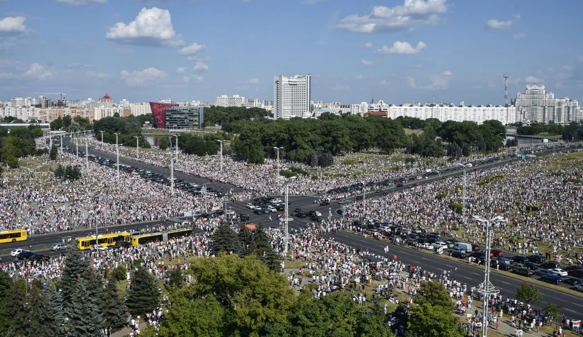 Belarus opposition supporters attend a rally in central Minsk on Aug. 16, 2020. The Belarusian strongman, who has ruled his ex-Soviet country with an iron grip since 1994, is under increasing pressure from the streets and abroad over his claim to have won re-election on Aug. 9, with 80 percent of the vote. (Sergie Gapon/AFP via Getty Images)