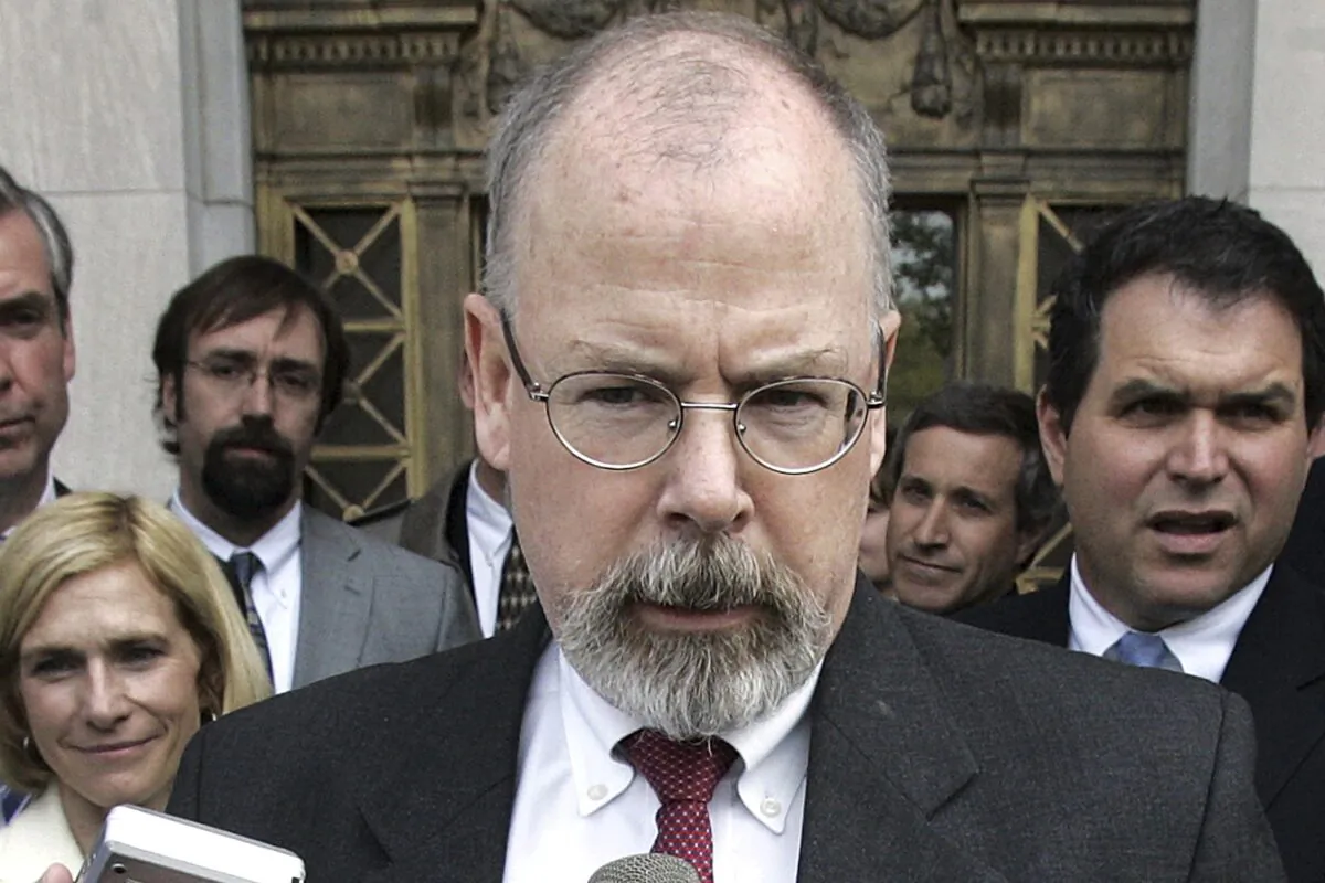 John Durham speaks to reporters on the steps of U.S. District Court in New Haven, Conn., on April 25, 2006. (Bob Child/AP Photo)