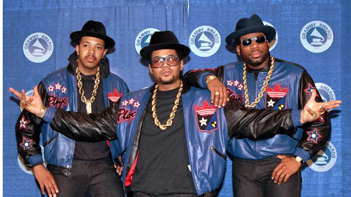 The rap group Run-DMC, from left, Joseph "Run" Simmons, Darryl "DMC" McDaniels, and Jason Mizell "Jam Master Jay," poses at the 31st annual Grammy Awards in New York City, on March 2, 1988. (Mark Lennihan/AP Photo)