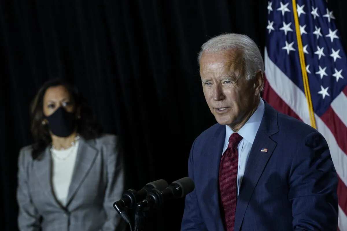 Democratic presidential nominee Joe Biden and Sen. Kamala Harris (D-Calif.) speak in a press conference in Wilmington, Del., on Aug. 13, 2020. (Drew Angerer/Getty Images)