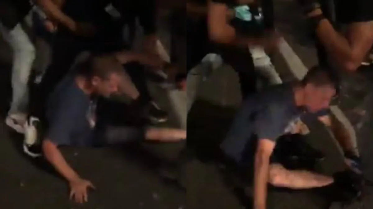 A man is punched repeatedly in Portland, Ore., on Aug. 16, 2020. (Drew Hernandez via The Epoch Times)