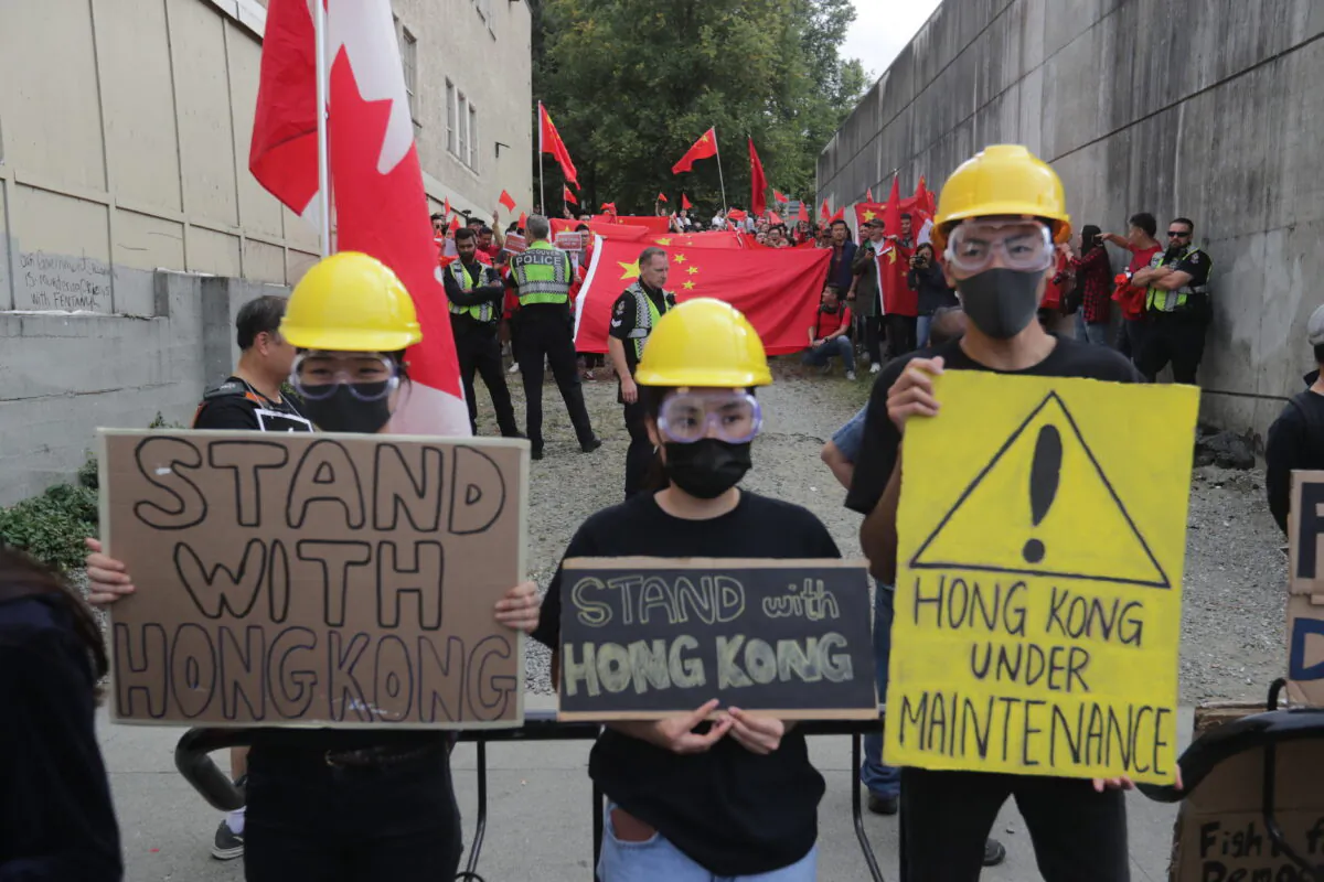 Protesters take part in a rally against the proposed Hong Kong extradition bill, in Vancouver on Aug. 17, 2019. (Darryl Dyck/The Canadian Press)