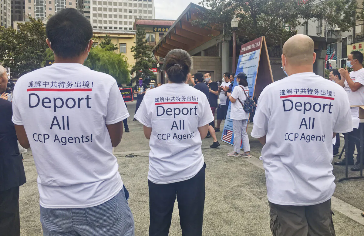 Pro-democracy activists hold a rally at Portsmouth Square in San Francisco’s Chinatown on Aug. 16, 2020, to urge pro-communist associations to remove the PRC flag. (Ilene Eng/The Epoch Times)