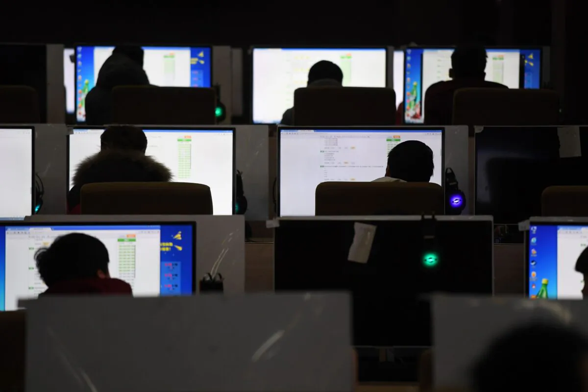 Students sit an exam in a computer room at a technical school in Jinan,  Shandong Province, China, on January 29, 2018. (GREG BAKER/AFP via Getty Images)