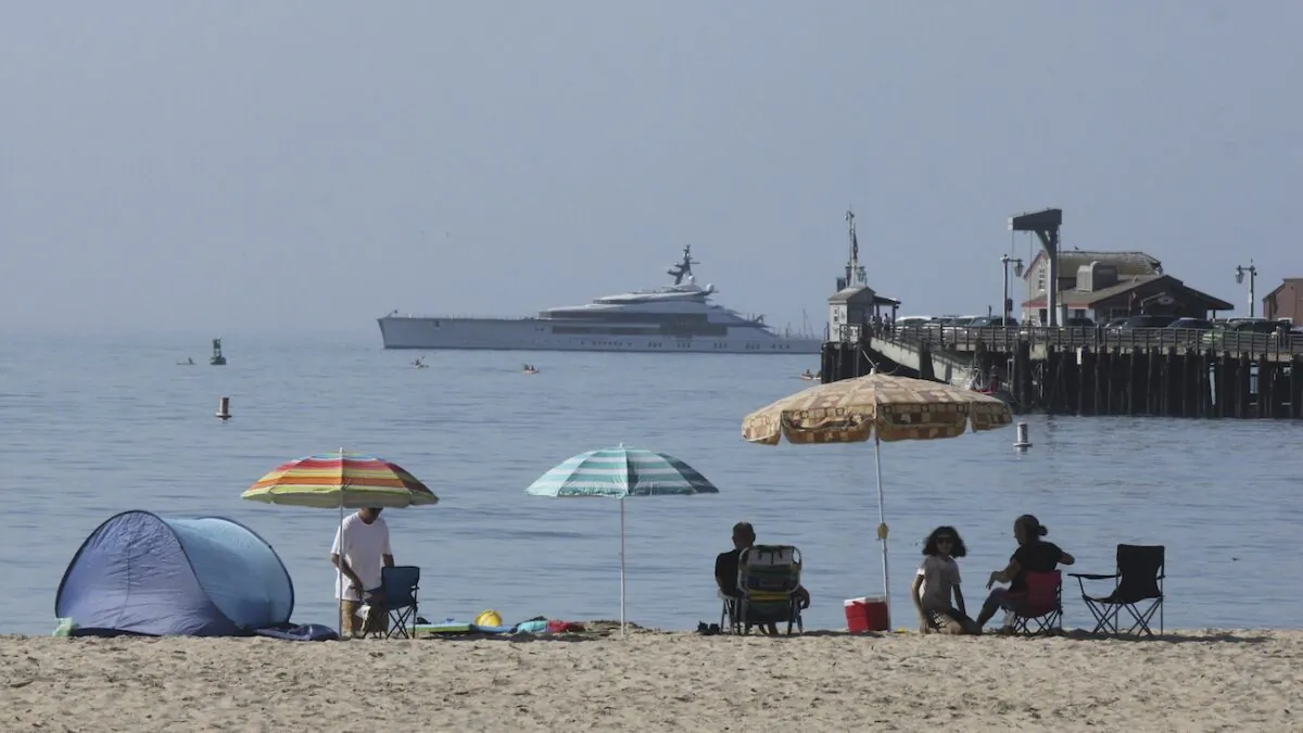 Visitors enjoy the beach at Santa Barbara, Calif., on Aug. 16, 2020. (John Antczak/AP Photo)