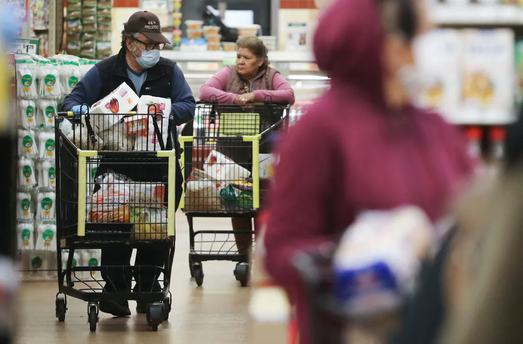 Seniors shop for groceries during special hours open to seniors and the disabled at Northgate Gonzalez Market, a Hispanic specialty supermarket, in Los Angeles, Calif., on March 19, 2020. (Mario Tama/Getty Images)