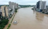 Typhoon, Floods Batter China as Heavy Rain Threatens Three Gorges Dam