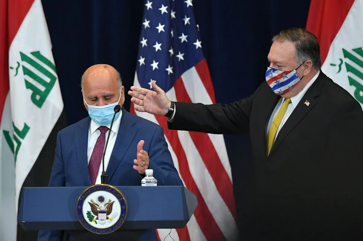 U.S. Secretary of State Michael Pompeo (R) arrives with Iraq's Foreign Minister Fuad Hussein for a press conference at the State Department in Washington, DC on Aug. 19, 2020. (MANDEL NGAN/AFP via Getty Images)