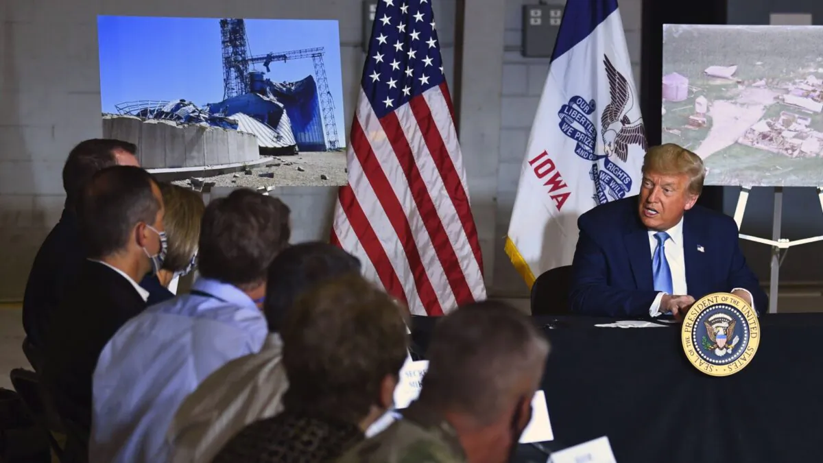 President Donald Trump participates in an Iowa Disaster Recovery Briefing at the Eastern Iowa Airport in Cedar Rapids, Iowa, on Aug. 18, 2020. (Brendan Smialowski/AFP via Getty Images)