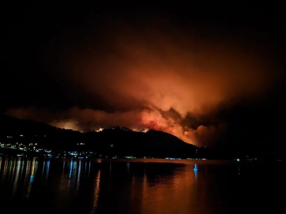 The Christie Mountain wildfire is shown on the East side of Skaha Lake near Okanagan Falls, B.C. in this image provided by the B.C. Wildfire Service late Tuesday evening, August 18, 2020. (The Canadian Press/HO-B.C. Wildfire Service)