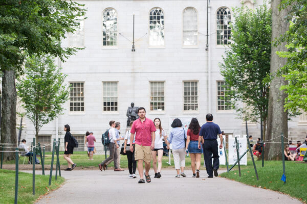 Pedestrians at Harvard University in Cambridge, Mass., on Aug. 30, 2018. Students are now required to get a flu vaccine to come on campus. (Scott Eisen/Getty Images)