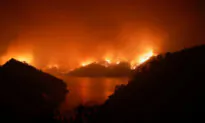 2 Die Fighting California Lightning Fires, Tens of Thousands Flee
