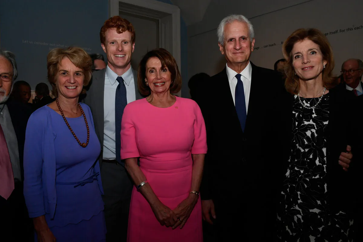 House Speaker Nancy Pelosi (D-Calif.), center, with Rep. Joe Kennedy, second from left, during an event in Washington in 2017. (Larry French/Getty Images for WS Productions)