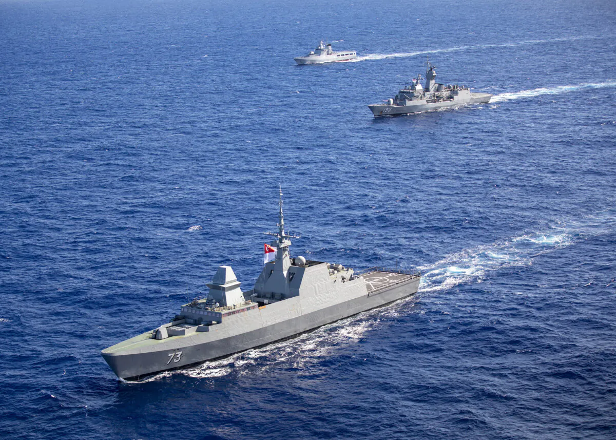 Her Majesty's Australian Ship Stuart sails in company with the Republic of Singapore Ship Supreme and Kapal Diraja Brunei (Royal Brunei Ship) Daruleshan through the Pacific Ocean as they prepare to take part in Exercise Rim of the Pacific 2020 on Aug. 17, 2020. (Australian Department of Defence)