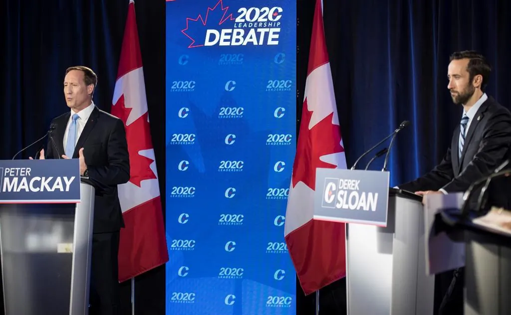 Conservative Party of Canada leadership candidates Peter MacKay (L) and Derek Sloan participate in the English debate in Toronto on June 18, 2020. (The Canadian Press/Tijana Martin)