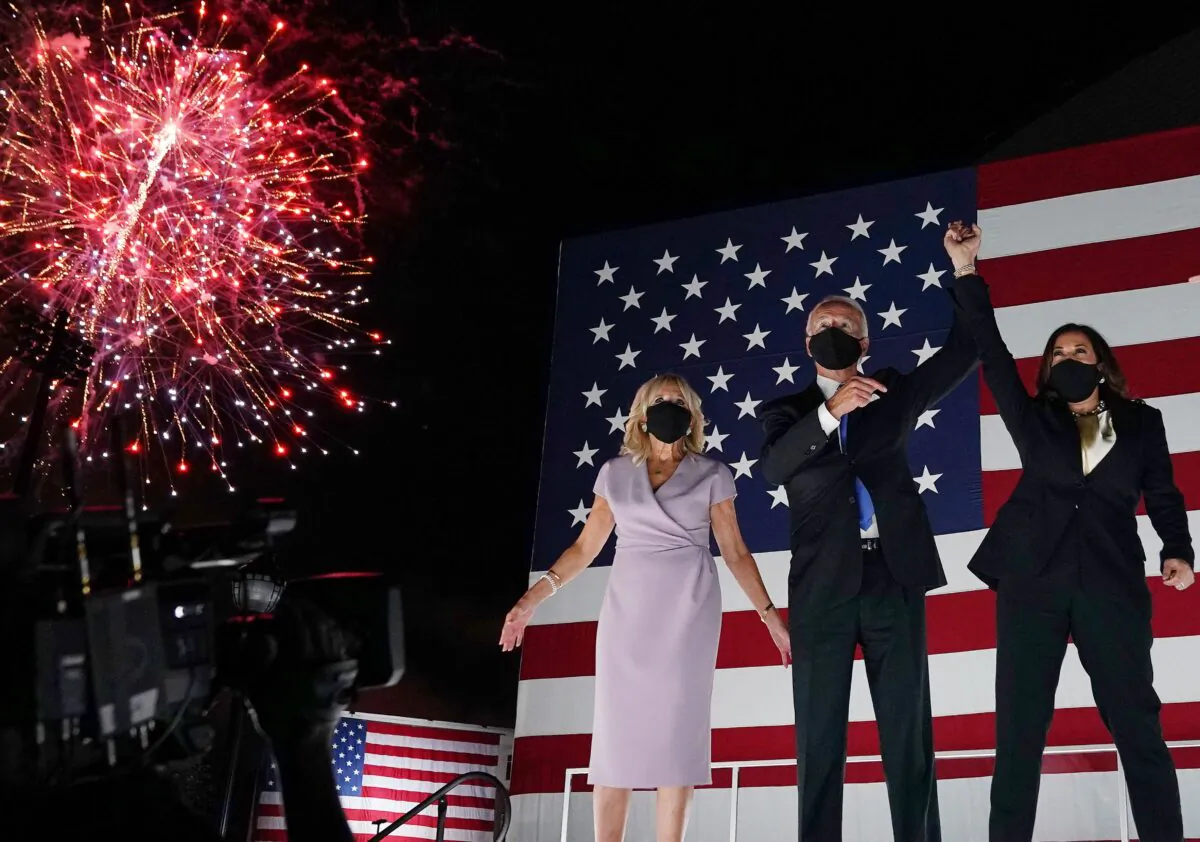 (From L) Jill Biden, husband former vice-president and Democratic presidential nominee Joe Biden and senator from California and Democratic vice presidential nominee Kamala Harris greet supporters outside the Chase Center in Wilmington, Delaware, at the conclusion of the Democratic National Convention, held virtually amid the CCP virus pandemic, on Aug. 20, 2020. (Olivier Douliery/AFP via Getty Images)